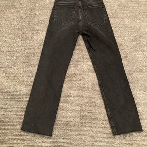 Black 90s jeans with frayed bottom